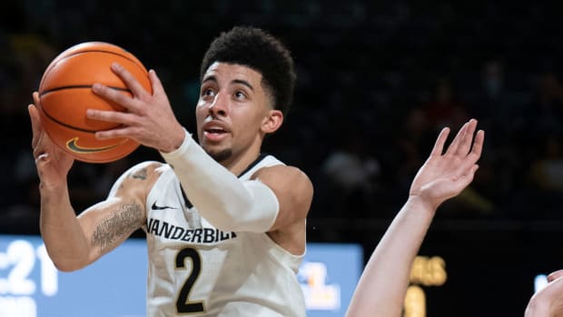 Vanderbilt Commodores guard Scotty Pippen Jr. (2) flies to the basket past Loyola Ramblers center Jacob Hutson (22) during the second half at Memorial Gymnasium Friday, Dec. 10, 2021 in Nashville, Tennessee.